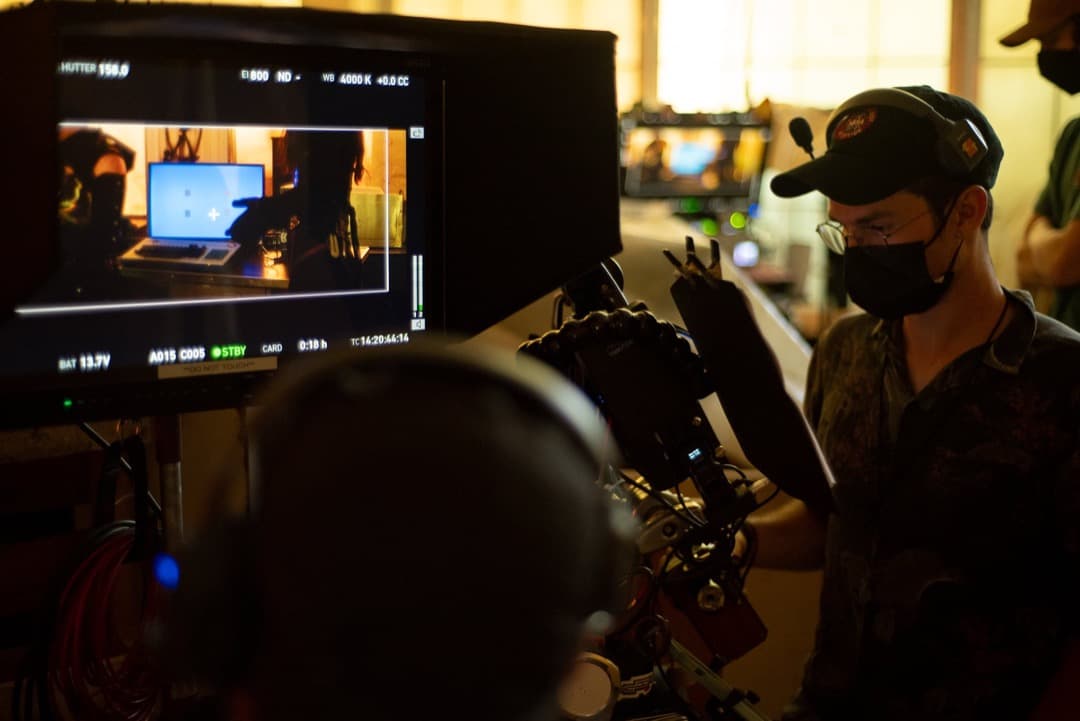 Behind the scenes photo 16 from Clone Cops production showing 1st ac chase lochamire preparing for a scene